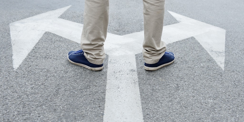 man-standing-hesitating-to-make-decision-picture-id170104934 man-standing-hesitating-to-make-decision-picture-id170104934